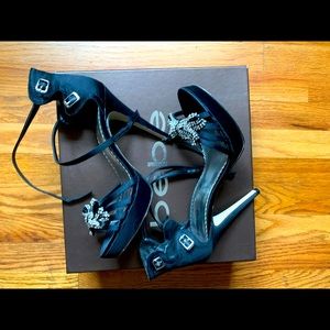 Size 9 BEBE women’s high heels worn 2x 100$